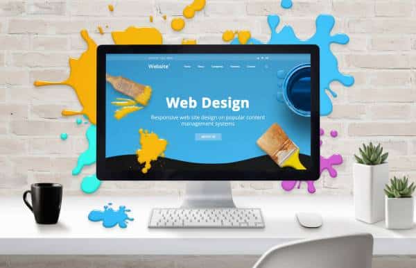 Mejores planes y precios de páginas web en Colombia​ imagen que muestra diseño de una web atractiva en colores azules y amarillos